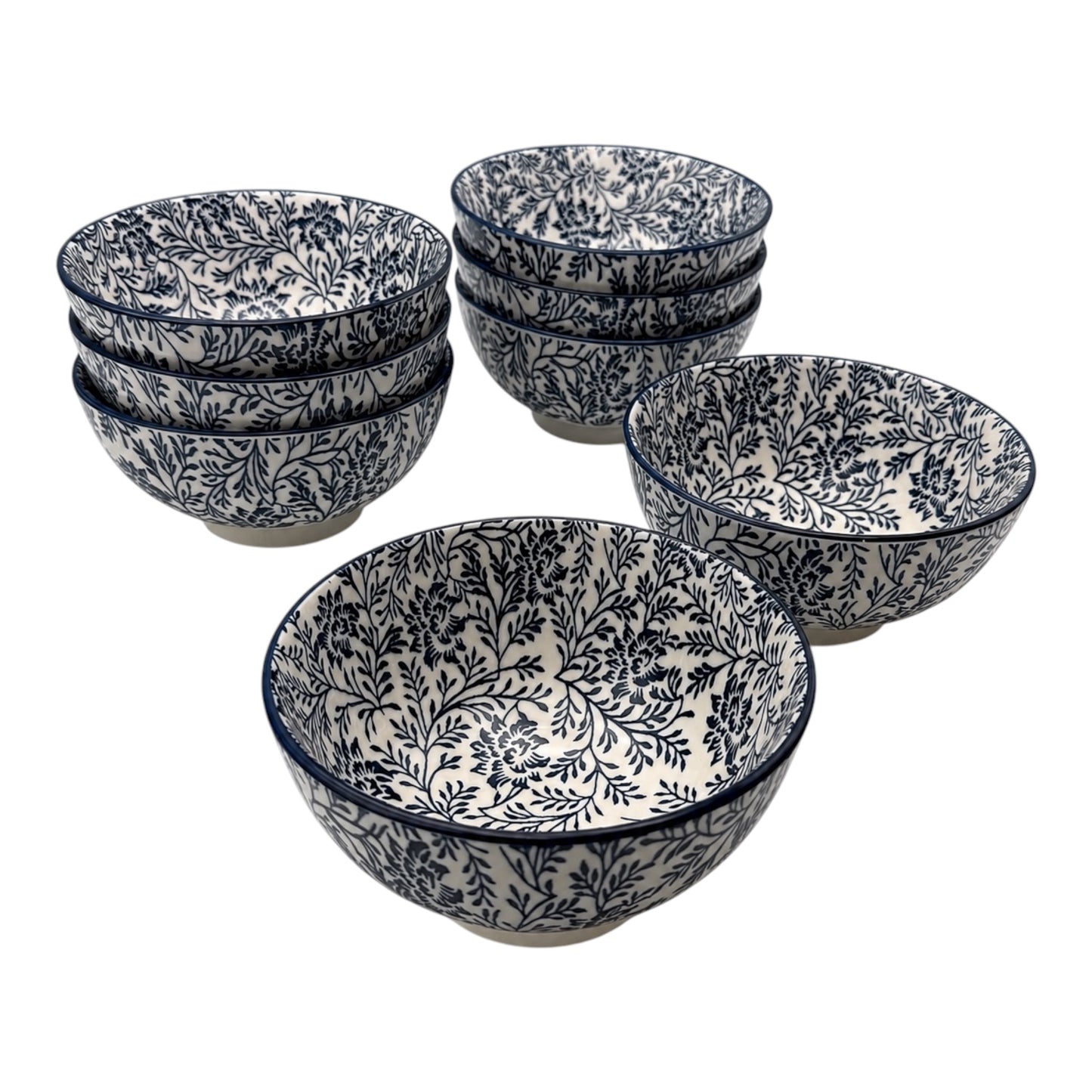 A set of 8 Porcelain bowls with a navy blue floral and botanical pattern on a white background, arranged on a clean white studio background.