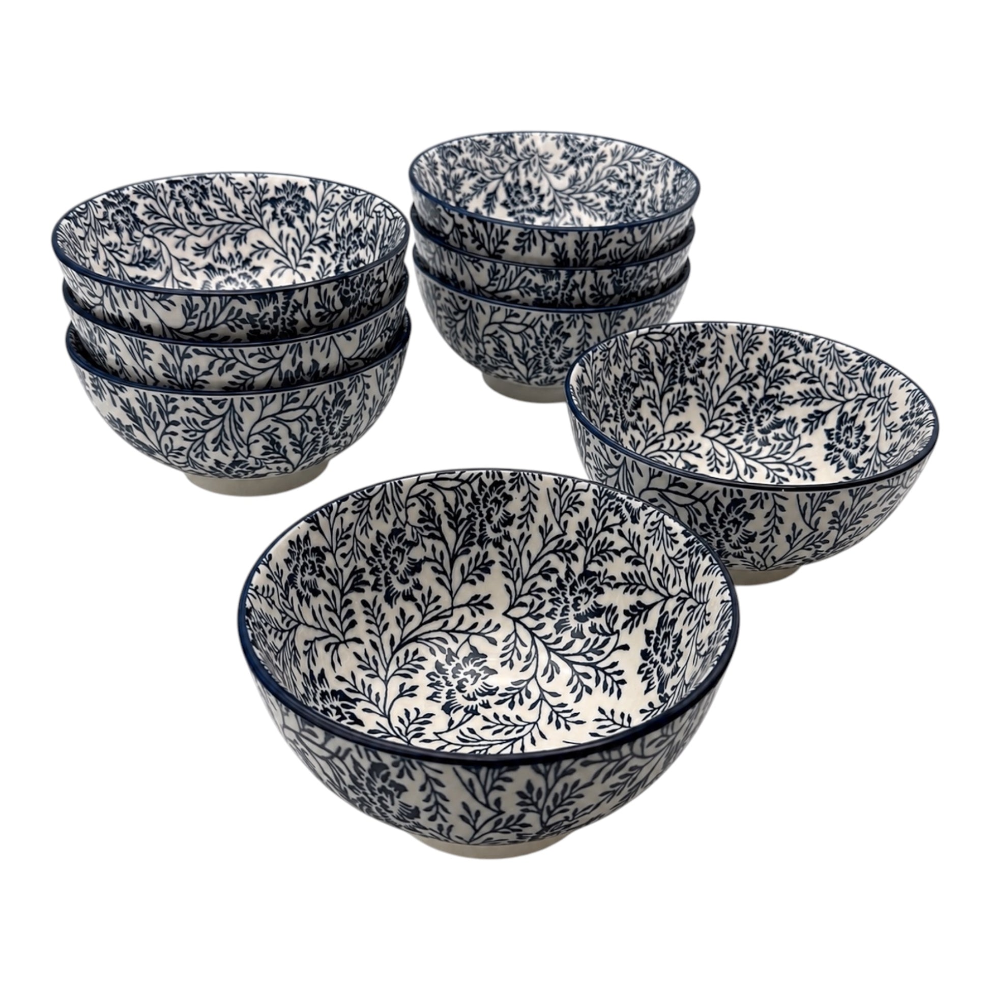 A set of 8 Porcelain bowls with a navy blue floral and botanical pattern on a white background, arranged on a clean white studio background.
