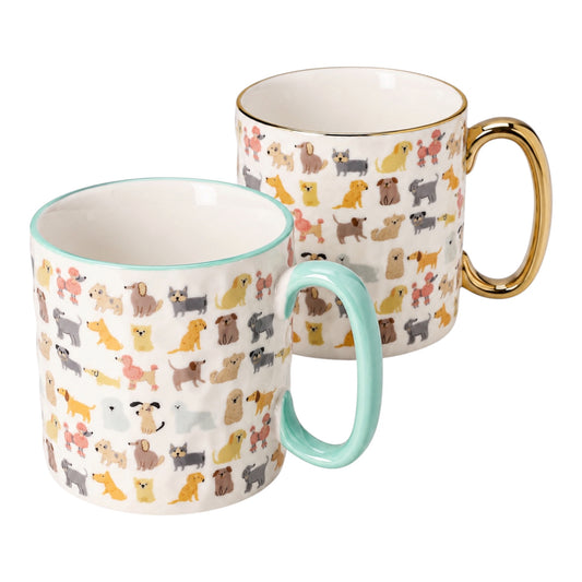 Two ceramic mugs with a colorful pattern of various dog illustrations on a white background. One mug has a mint green handle and rim, and the other has a gold handle and rim.