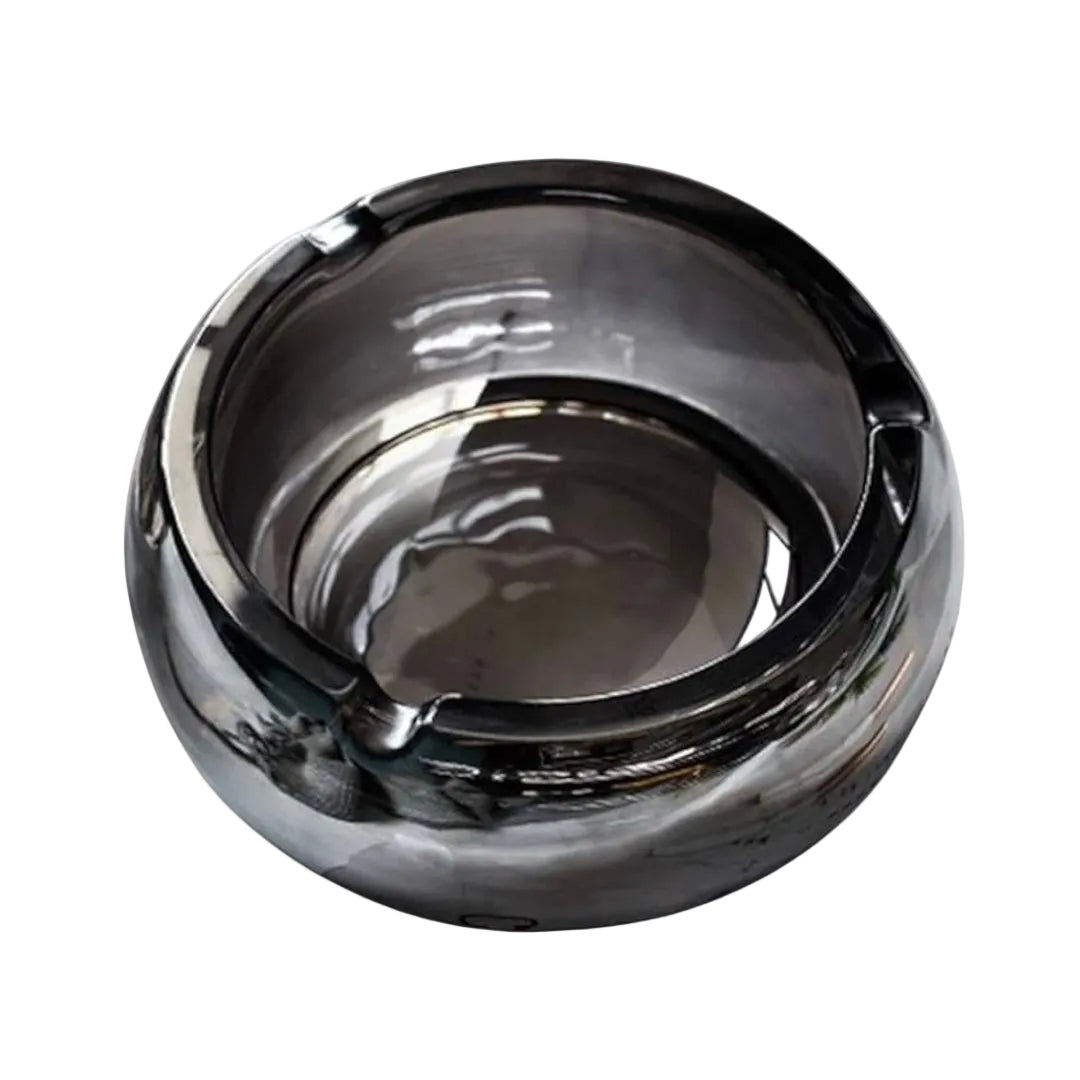 Chrome glass ashtray on a white background