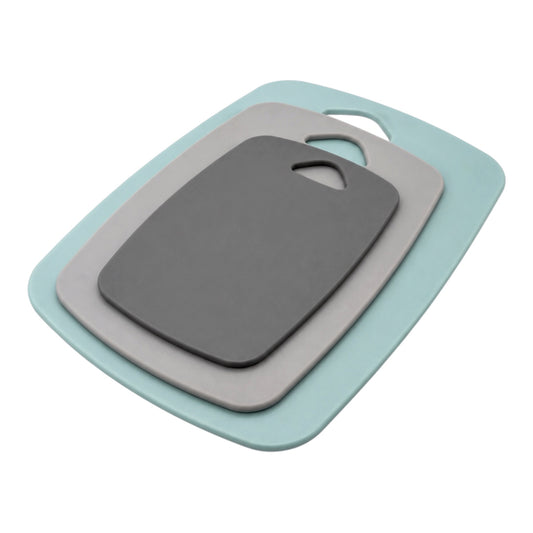 Three nested rectangular cutting boards with rounded corners and handle cutouts, shown on a plain white background. The boards are stacked in size order, with a light aqua outer board, a medium gray middle board, and a dark charcoal gray inner board.